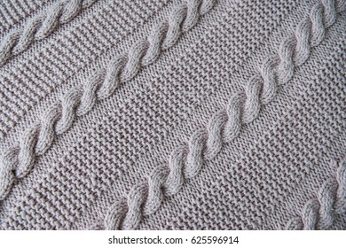 Wool Handmade Knitted Large Blanket. Gray Cloth Texture Background. Knitted Scarf.