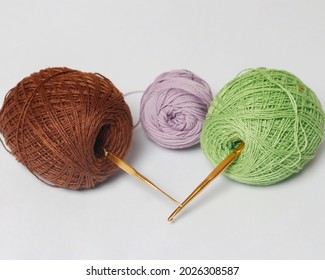 Wool thread isolated on bright background. Wool yarn is a yarn with a soft texture. Usually used for the main material for making knitting crafts such as clothes and hats. Focus blur. - Powered by Shutterstock