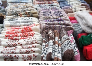 Wool Warm Mittens On The Counter. Winter