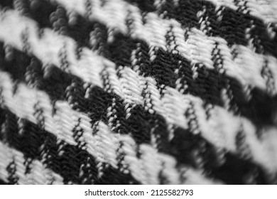 Woolen Fabric In Black And White Check With A Pepita Pattern. Macrophoto.