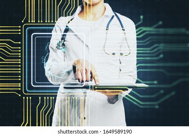 Wooman doctor using tablet with creative glowing digital heart futuristic interface hologram. Medicine, cardiology and future concept.