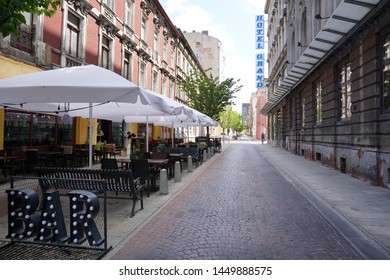 WOONERF, LODZ, POLAND, JULY 04  2019 :
Street Traugutta At Piotrkowska.  Woonerf - Alley In The Shade In The Morning