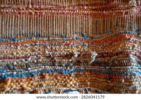 Wooven chaftwork handmade colorful pattern of cloth at the museum of Mallorca.