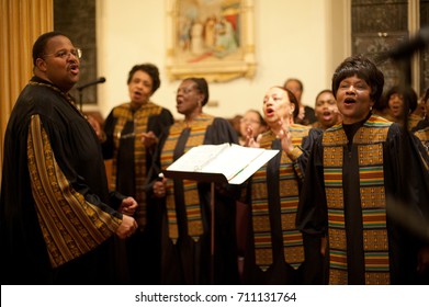 WORCESTER, MASSACHUSETTS - MARCH 6, 2011: Archdiocese Of Boston Black Catholic Choir Director Meyer J. Chambers And Member Joyce Durst (foreground) Perform At St. Peter's Catholic Church In Worcester.