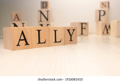 The word Ally is from wooden cubes. Background from wooden letters. Government and countries - Shutterstock ID 1926081410