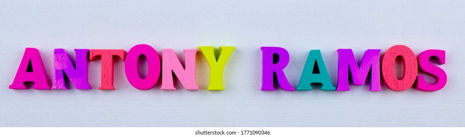 The Word Anthony Ramos Written In Colored Letters On A White Background