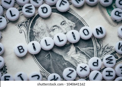 Word BILLION Made From Small White Letters On Dollar Background  