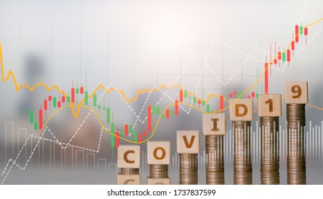 Word block COVID 19 on coins stack and financial stock market graph, Savings money and investment for business concept, Coronavirus impact global economy stock markets financial crisis concept.