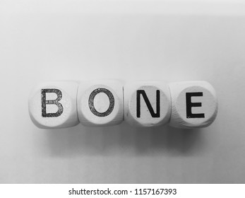word bone spelled on dice - Shutterstock ID 1157167393
