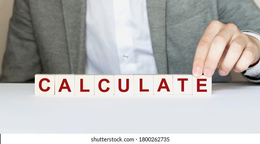 Word CALCULATE made with wood building blocks - Shutterstock ID 1800262735