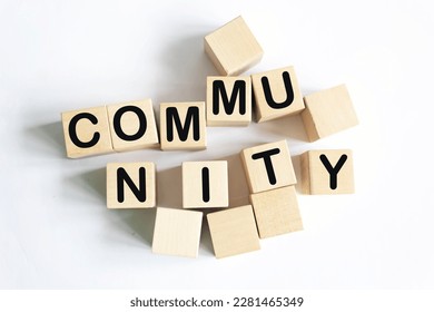 The word Community is written on a wooden block. Community text on white background - Shutterstock ID 2281465349