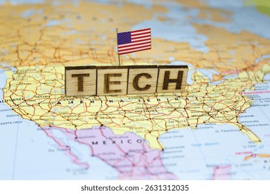 The word “TECH” is composed of wooden blocks on a map of the United States with the US flag, emphasizing the role of the technology sector in America’s digital economy and innovation - Powered by Shutterstock - Get 15% off with code: PIKWIZARD15
