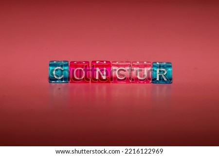 the word 'concur' made up of cubes	
 Imagine de stoc © 