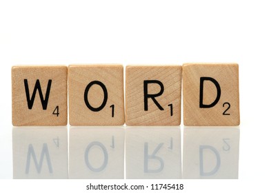 Word Construction With Scrabble Blocks On White Background