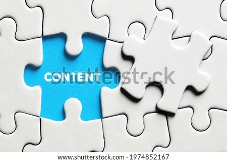 The word content on a missing puzzle piece. Online website content concept.