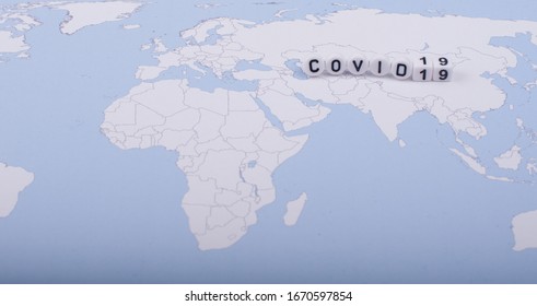 The Word Covid 19,isolated Over World Map,current Issue Concept