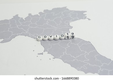 The Word Covid 19,over Italy Map,medical Concept