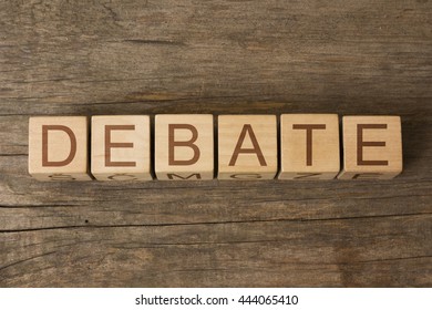 the word of DEBATE on wooden cubes - Shutterstock ID 444065410