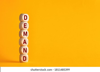 The Word Demand On Stacked Wooden Cubes. Demand Increase Or Rise In Economy Or Business Concept.