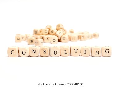 word with dice on white background - consulting