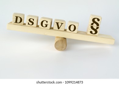 Word DSGVO formed by wood blocks abbreviation for german law