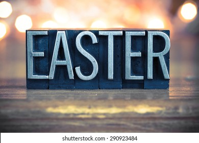 The word EASTER written in vintage metal letterpress type on a soft backlit background.