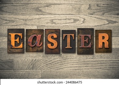 The word "EASTER" written in wooden letterpress type.