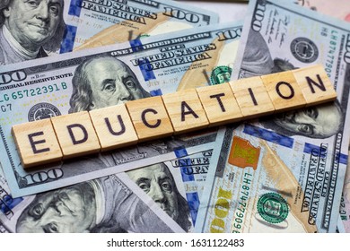 The Word Education On Dollar Usa Background. College Credits, Graduation Funds, Tuition Money Concept