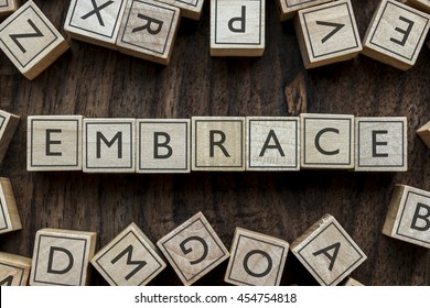 the word of EMBRACE on building blocks concept