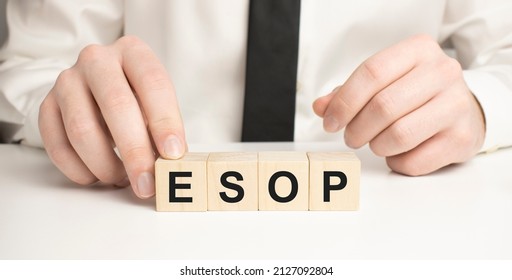 word ESOP on wooden blocks, white background, business concept. business and Finance
