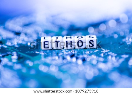 Word ETHOS formed by alphabet blocks on mother cryptocurrency