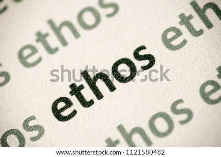 word ethos  printed on white paper macro
