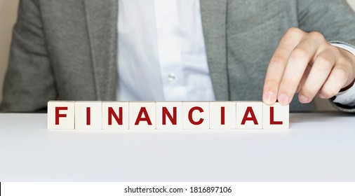 Word FINANCIAL made with wood building blocks. New normal - Shutterstock ID 1816897106