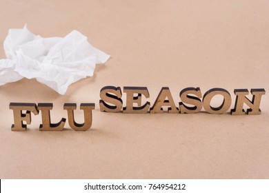 Word FLU  SEASON Abstract Wooden Letters, Background Vintage Craft Paper, Napkin