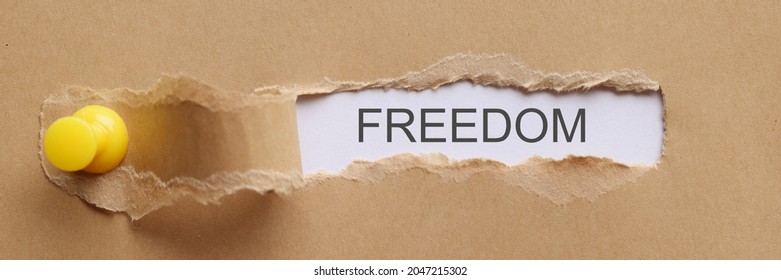 word-freedom-written-on-torn-piece-stock-photo-2047215302-shutterstock