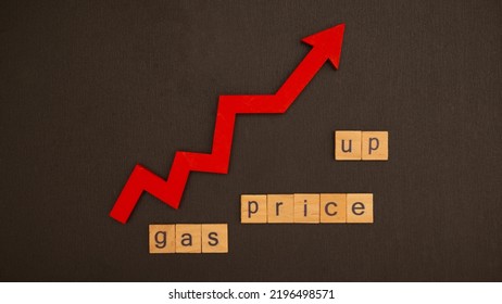 Word Gas Price Up Assembled From Wooden Letters Game And Red Arrow On Black School Chalkboard