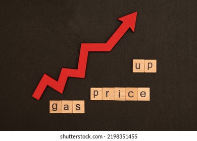 Word Gas Price Up Assembled From Wooden Letters Game And Red Arrow On Black School Chalkboard