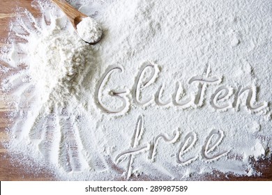 Word Gluten Free On Wood Board With Flour