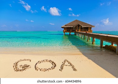 Word Goa on beach - nature holiday background