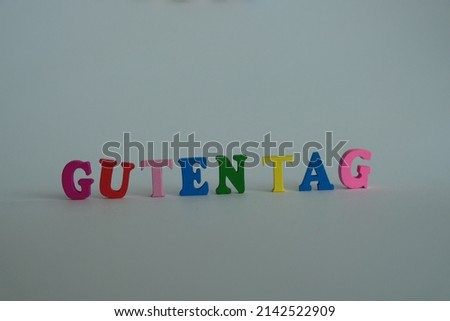 Word 'Guten Tag' on white background. Guten Tag is the word for German say Hello or greetings.