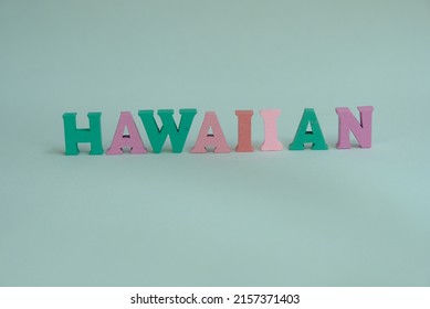 Word 'Hawaiian' Oh White Background. Hawaiian Is A Polynesian Language Of The Austronesian Language Family That Takes Its Name From Hawaiʻi.