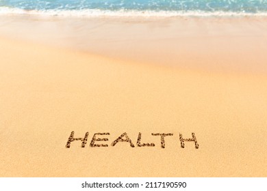 Word health writing on sand beach. Health care, living healthy lifestyle symbol.  - Powered by Shutterstock