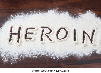 The Word Heroin Written In A White Powder