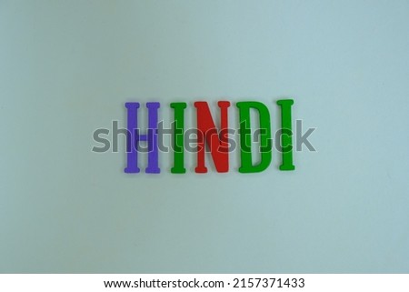 Word 'Hindi' oh white background. Hindi, or Modern Standard Hindi, is an Indo-Aryan language spoken chiefly in the Hindi Belt region encompassing parts of northern, central, eastern and western India.