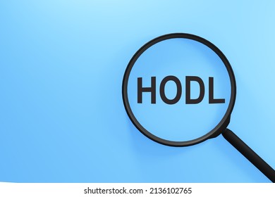 Word HODL through magnifying glass on blue