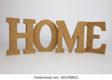 Word Home Made Of MDF On A White Background