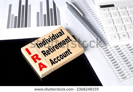 Word IRA made with wood building blocks, business
