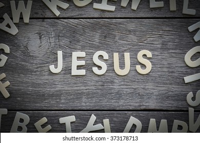The word jesus on the wooden floor