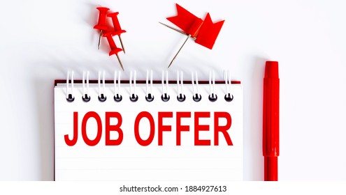 The Word JOB OFFER Is Written In The Notebook With Office Tools . Business Concept