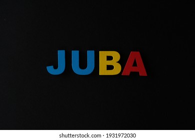 Word Juba on black background. Juba is the capital city of South Sudan.